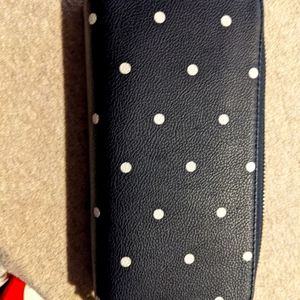 Navy with white polka dots double zipper Wallet.  Used a few months